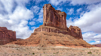 Stunning Sandstone Cliffs Under Vibrant Blue Skies