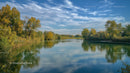Serene Lake with Reflective Water and Autumn Foliage