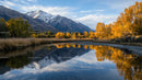 Scenic Autumn Landscape with Mountain Reflections in Tranquil River