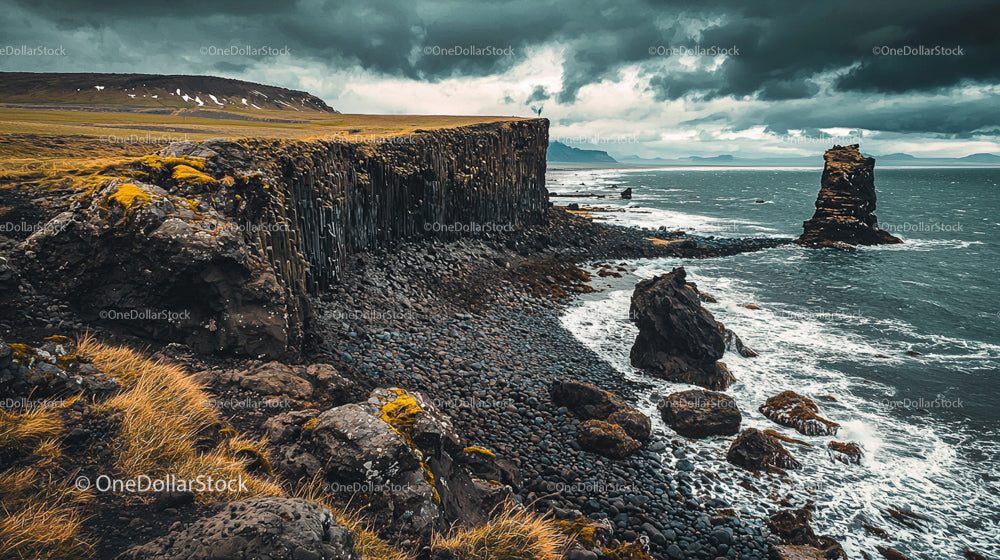 Dramatic Basalt Cliffs and Ocean Waves under Stormy Sky