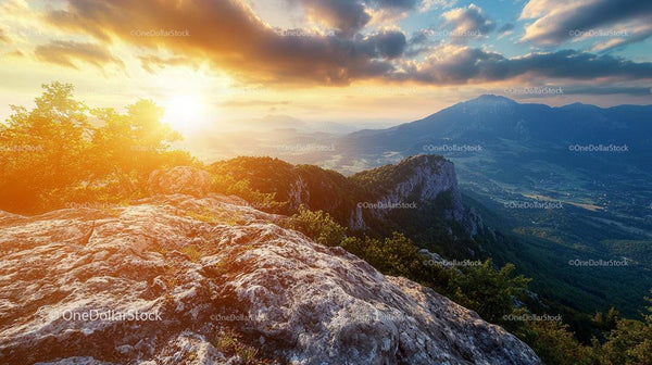 Sunrise Over Majestic Mountain Range and Rock Formation