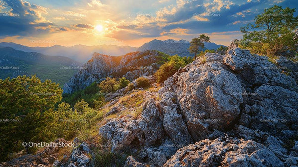 Majestic Mountain Sunset with Rugged Rocks and Lush Greenery