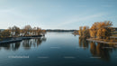 Peaceful Autumn Lake Scene with Golden Trees