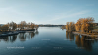 Peaceful Autumn Lake Scene with Golden Trees