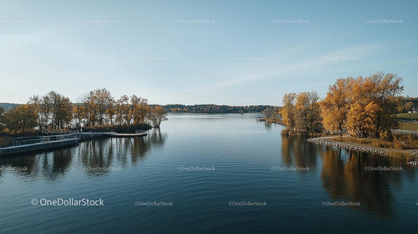 Peaceful Autumn Lake Scene with Golden Trees