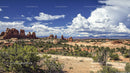 Majestic Red Rock Formations Under Expansive Blue Skies