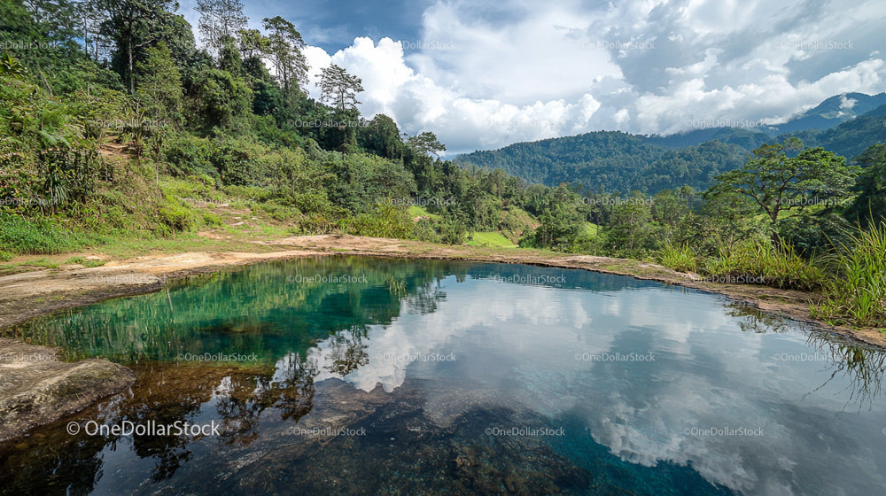 Pristine Natural Pool in Lush Mountainous Landscape
