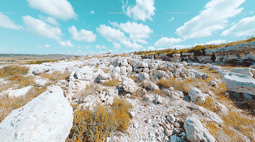 Rocky Limestone Landscape Under a Bright Blue Sky
