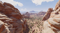 Dramatic Red Rock Formations in Expansive Desert Landscape