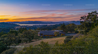 Countryside Sunset Over Rolling Hills and Serene Landscape