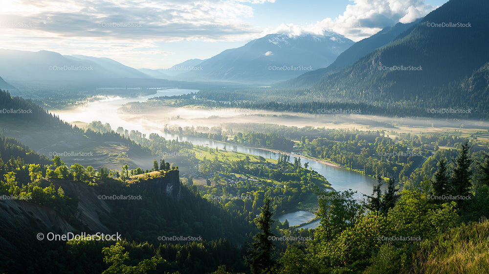 Misty Morning in a Mountain Valley with River View
