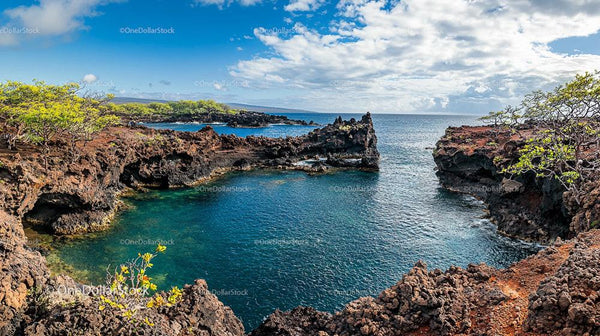 Turquoise Waters and Volcanic Cliffs at a Tropical Lagoon