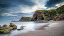 Tranquil Coastal Scene with Majestic Cliffs and Ocean Waves
