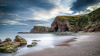 Tranquil Coastal Scene with Majestic Cliffs and Ocean Waves