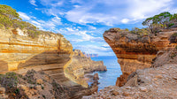Stunning Coastal Cliffs with Blue Ocean and Sky
