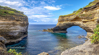 Stunning Coastal View of Natural Arch and Ocean