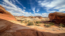 Dramatic Rock Formations under a Vibrant Blue Sky