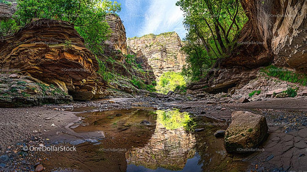 Scenic Rocky Canyon with Serene Water Reflection
