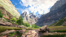 Majestic Mountain Valley with Lush Greenery and Blue Skies