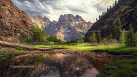 Majestic Mountain Range with Serene Water Reflection