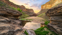 Tranquil Oasis in a Vibrant Gold Canyon at Sunset