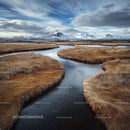 Snowy Mountains and Winding River in Scenic Landscape