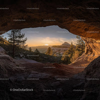 Spectacular Sunset View from a Rocky Cave in the Desert
