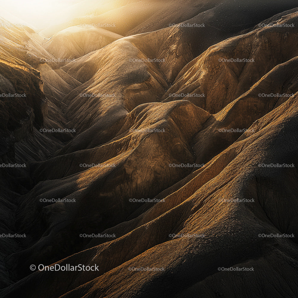 Golden Sunrise Over Rugged Desert Hills