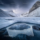 Frozen Mountain Landscape with Ice Formations and Snowy Peaks
