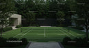 Private Tennis Court Surrounded by Lush Greenery