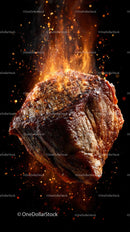 Flame-Kissed Grilled Steak Sizzling Over Open Fire