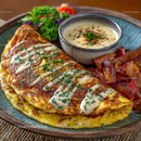 Savory Omelette with Bacon and Sauce on Rustic Plate