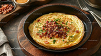 Savory Omelette with Crispy Bacon and Fresh Herbs