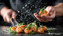 Chef Seasoning Fresh Shrimp with Herbs and Salt