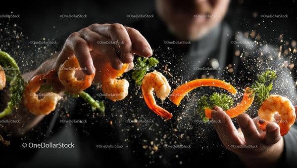 Chef's Hands Creating a Dynamic Seafood Dish with Shrimp