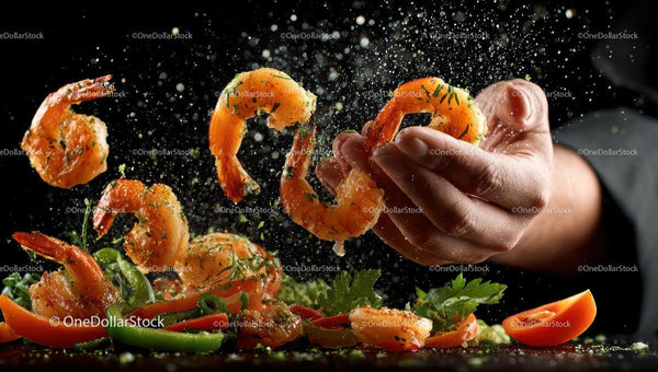 Chef Tossing Seasoned Shrimp with Fresh Herbs and Spices