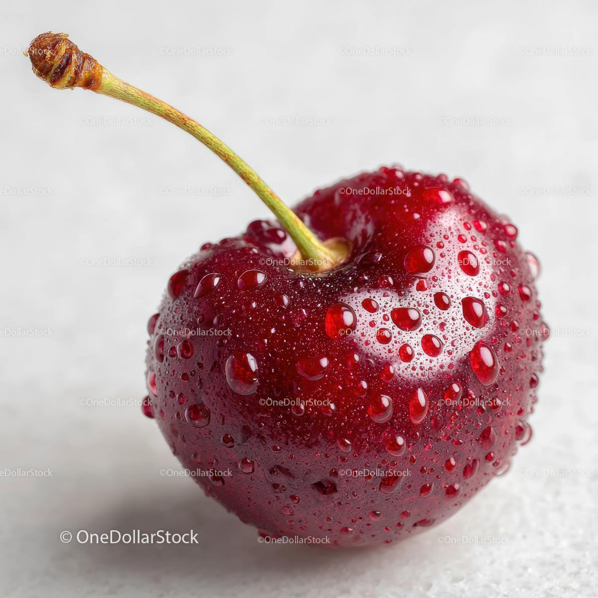 Fresh Red Cherry with Water Droplets on Light Surface