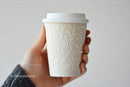 Eco-Friendly Textured Paper Cup in Hand