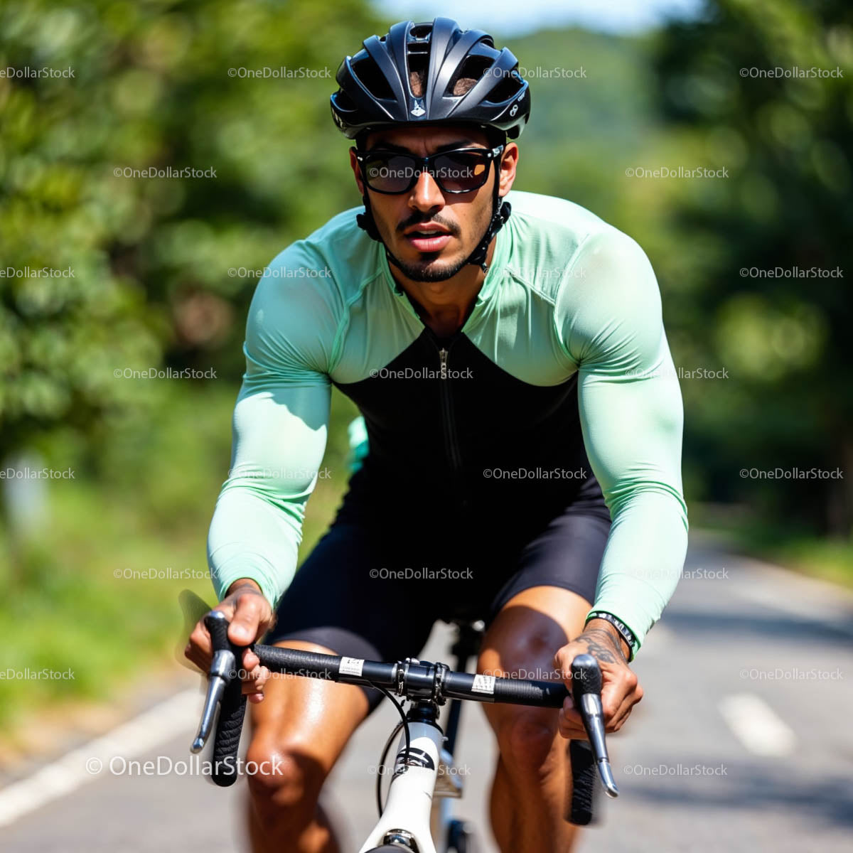 Cyclist Riding in the Sun on a Rural Road