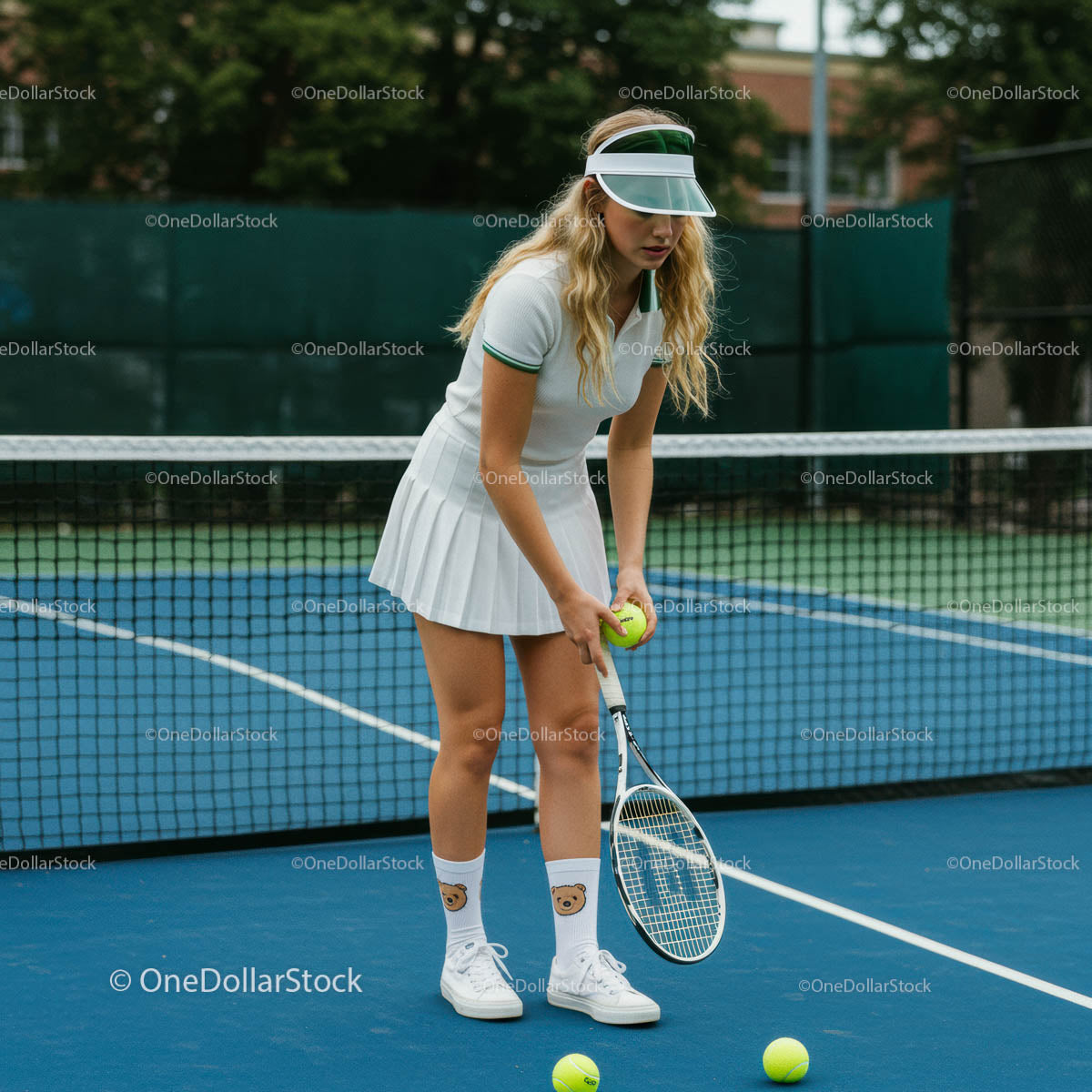 Young Female Athlete Preparing for Tennis Match