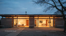 Modern Glass-Facade House at Dusk