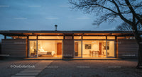Modern Glass-Facade House at Dusk