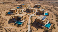 Aerial View of Luxurious Desert Villas with Pools