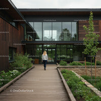 Modern Office Building with Wooden Exterior and Lush Garden