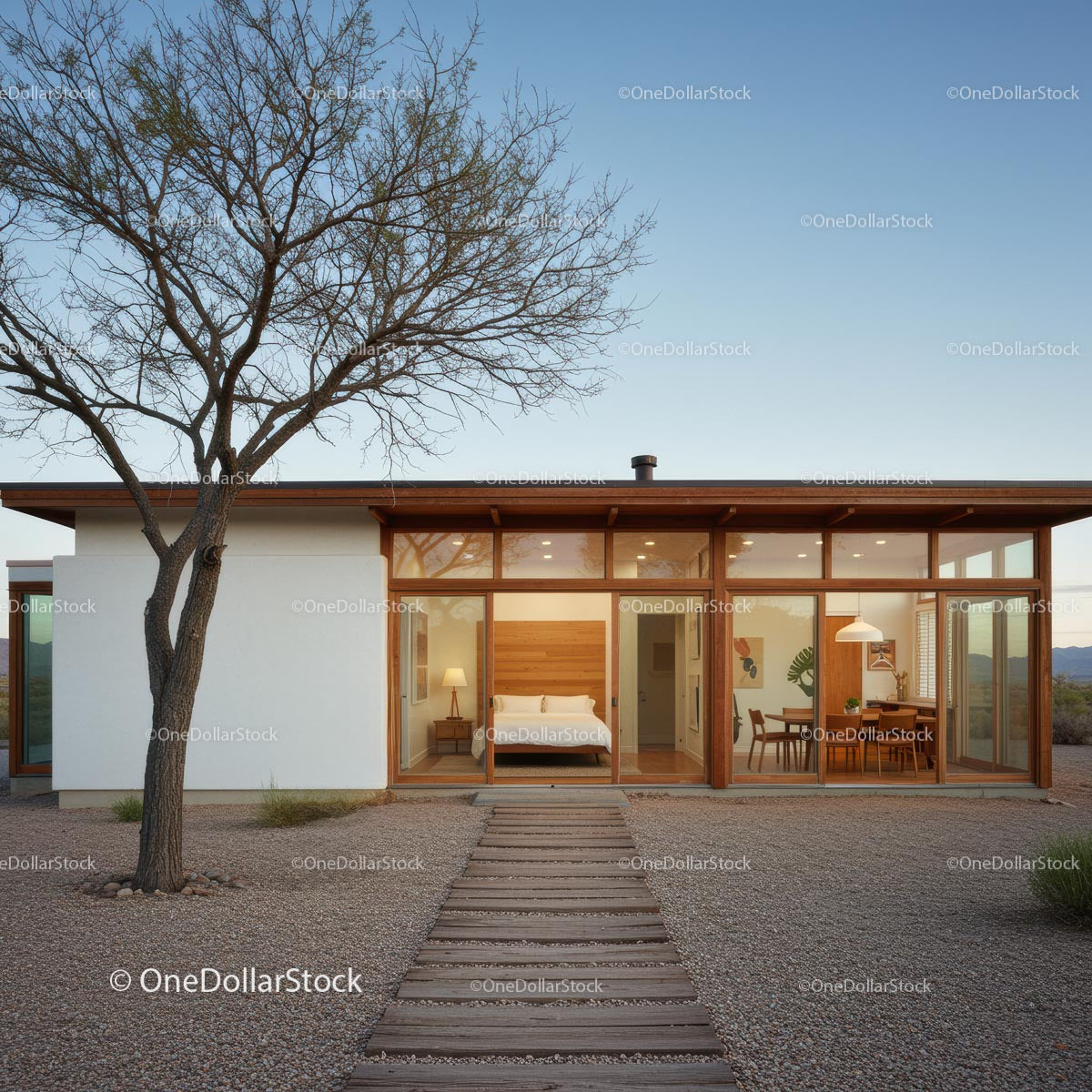 Modern Desert Home with Glass Facade and Open Interiors