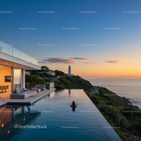 Luxury Villa with Infinity Pool Overlooking Ocean at Sunset