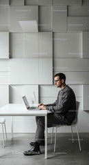 Stylish Minimalist Workspace with Focused Professional
