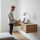 Young Professional Working at a Minimalist Standing Desk