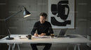 Man Writing Notes in Modern Minimalist Office Setting