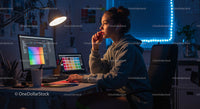 Creative Designer Working Late in Modern Home Studio